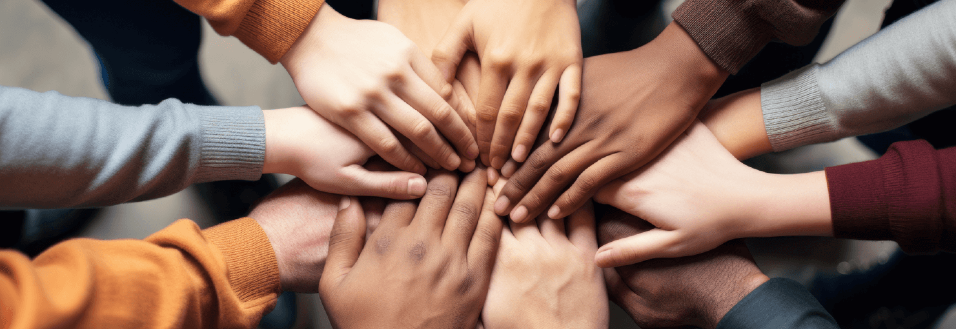 a group of hands in a circle